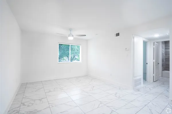 an empty room with windows