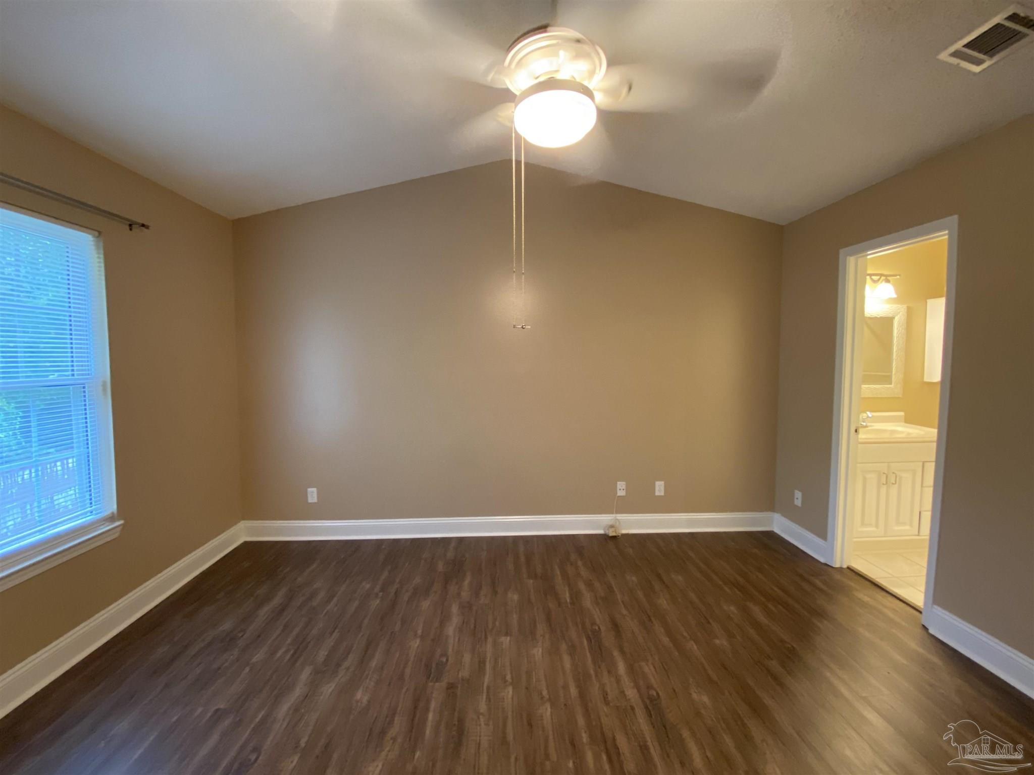 9022 Governors Pl Court Pensacola, FL 32514 - Photo 7 of 16 a view of room with hardwood floor and window