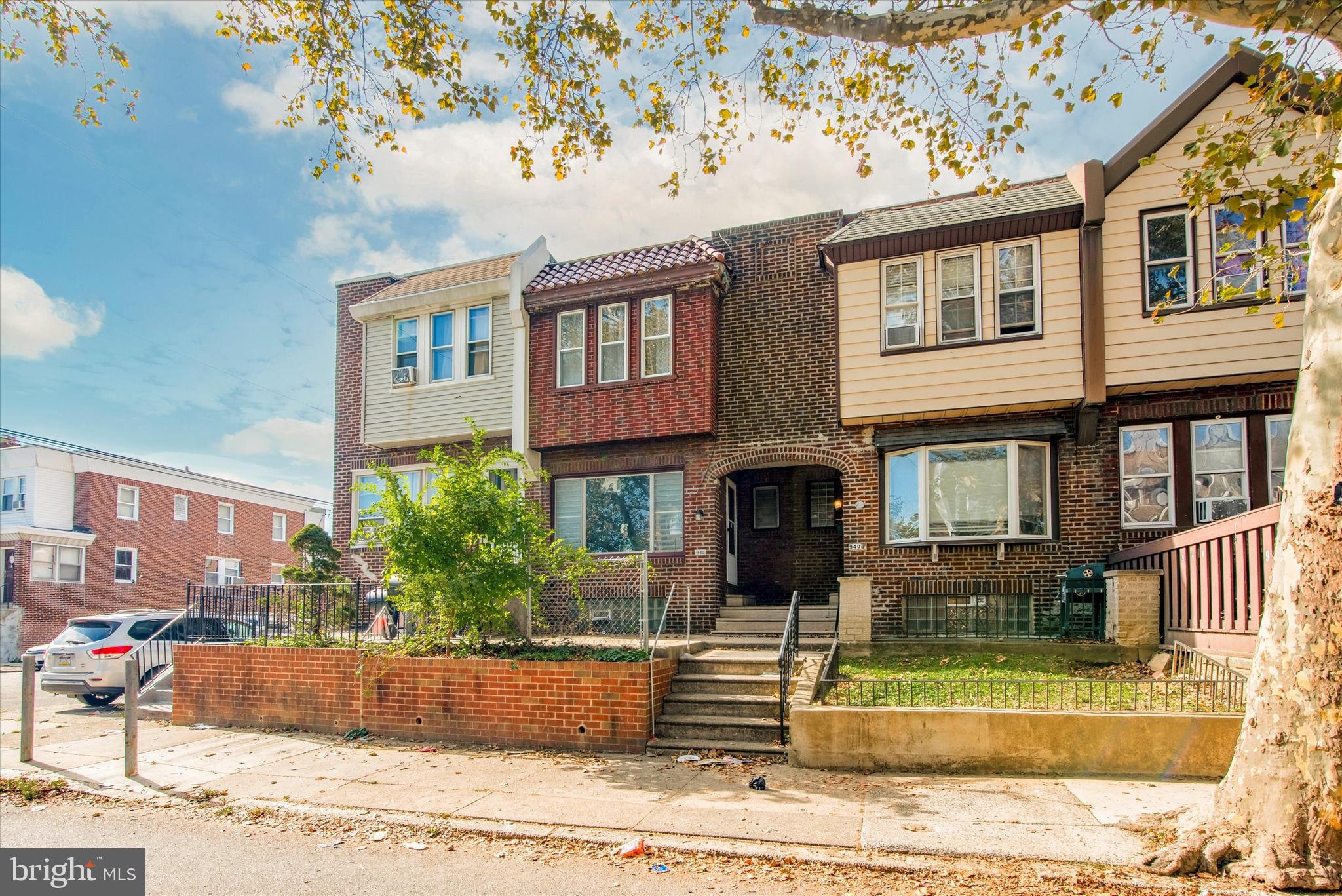 942 Anchor Street Philadelphia, PA 19124 - Photo 1 of 2 a front view of a house with garden