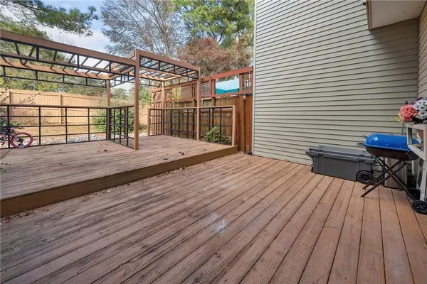a view of a backyard with sitting area