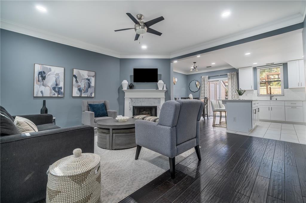 3539 Mt Vernon Circle Atlanta, GA 30340 - Photo 2 of 15 a living room with furniture a flat screen tv and a fireplace