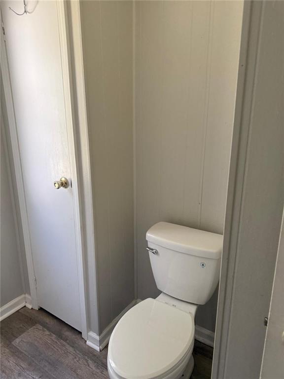 2457 Bold Springs Road Monroe, GA 30656 - Photo 17 of 23 a white toilet sitting next to a shower