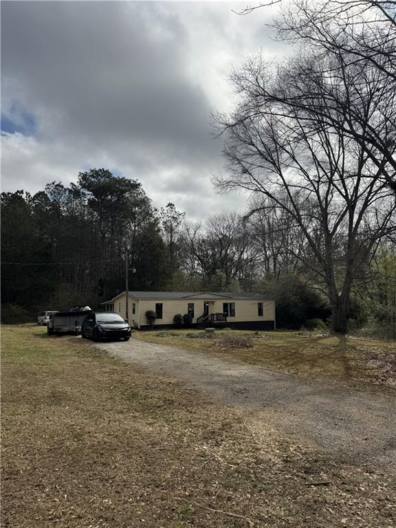 2457 Bold Springs Road Monroe, GA 30656 - Photo 4 of 23 a view of a yard with a slide