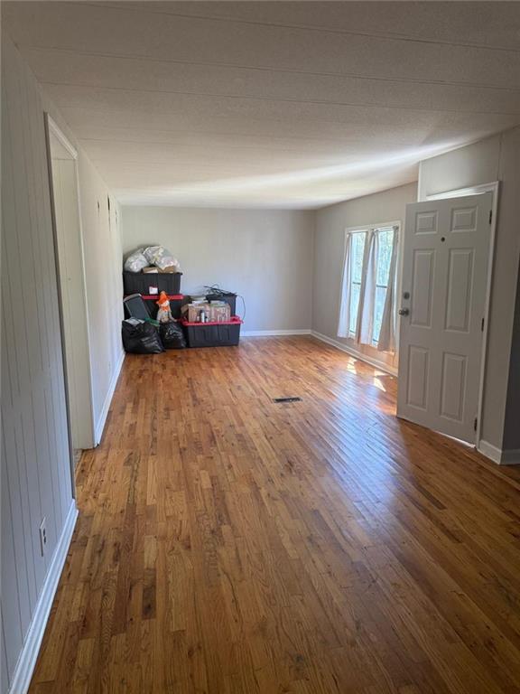 2457 Bold Springs Road Monroe, GA 30656 - Photo 7 of 23 a view of a livingroom with wooden floor and a window