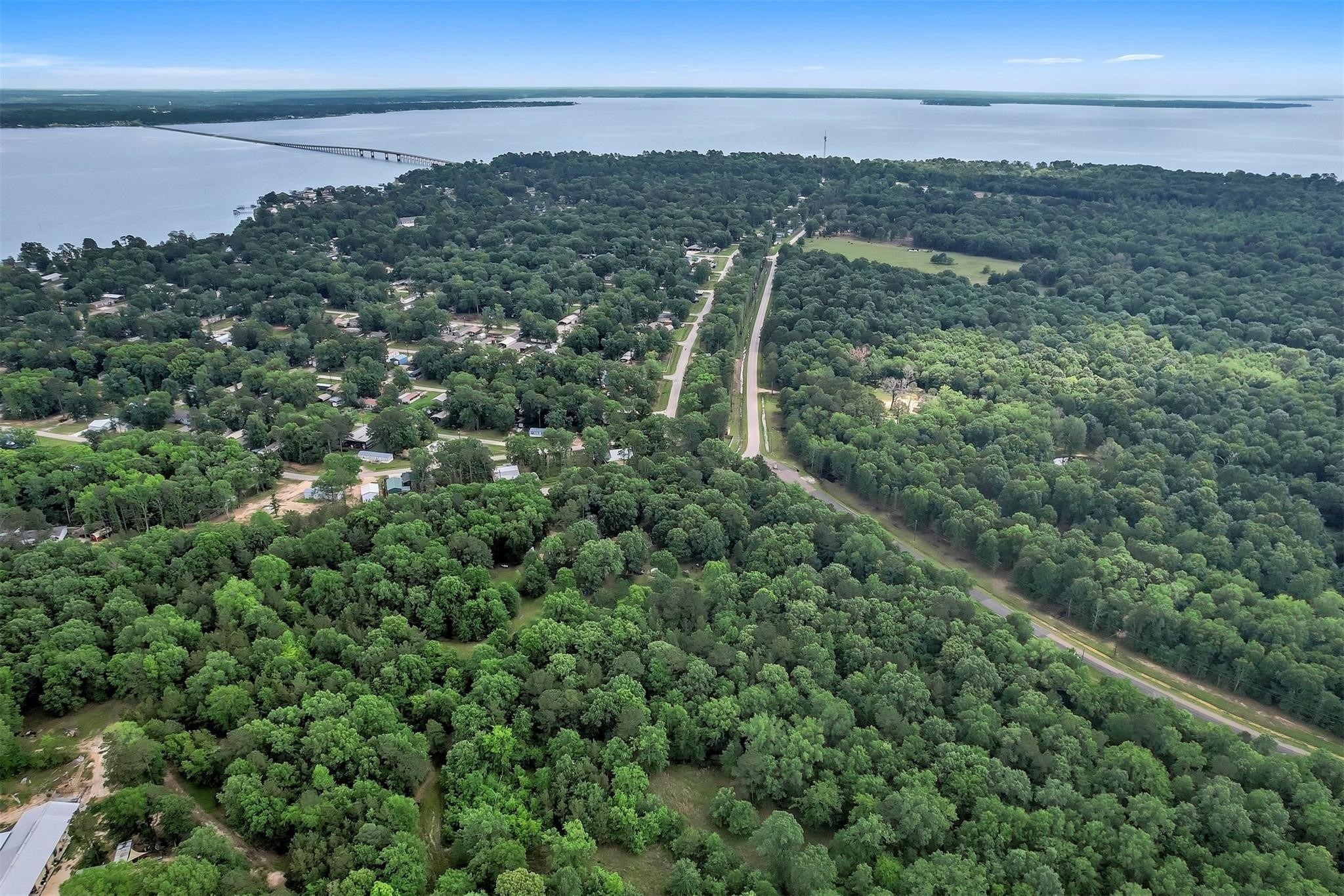 Tbd Somerset Trail Point Blank, TX 77364 - Photo 5 of 25 a view of a city with lush green forest