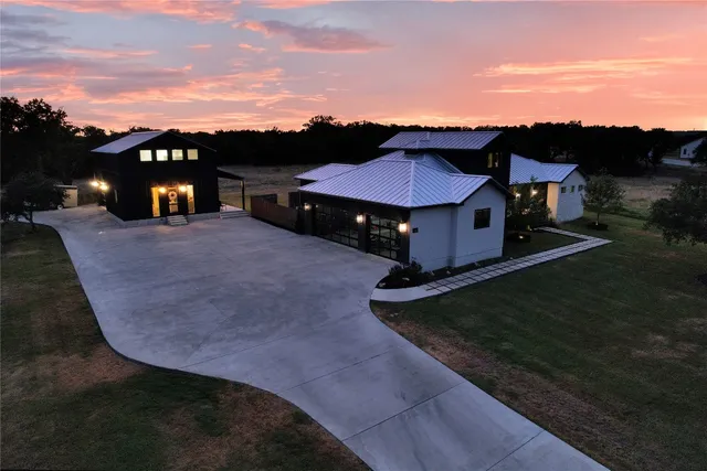 a view of a yard with an outdoor space