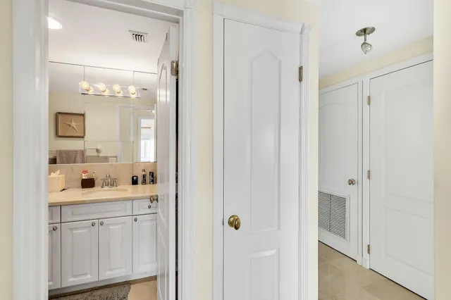 a bathroom with a sink and a shower