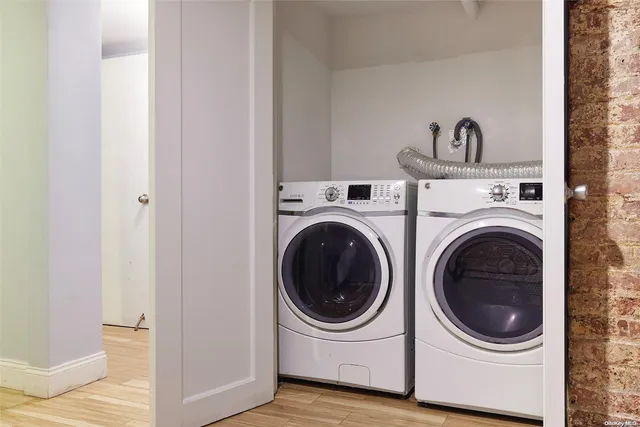 a utility room with dryer and washer