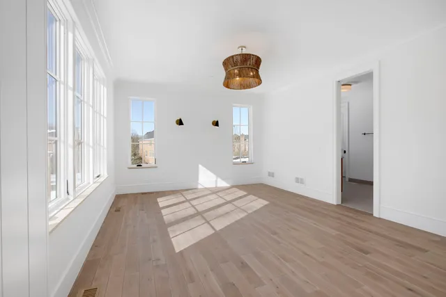 a view of an empty room and window