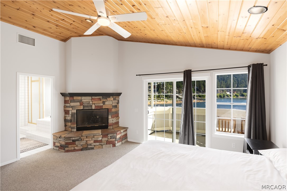 735 Tayles Point Road Big Bear Lake, CA 92315 - Photo 20 of 47 Owner suite with own fireplace and lakeviews