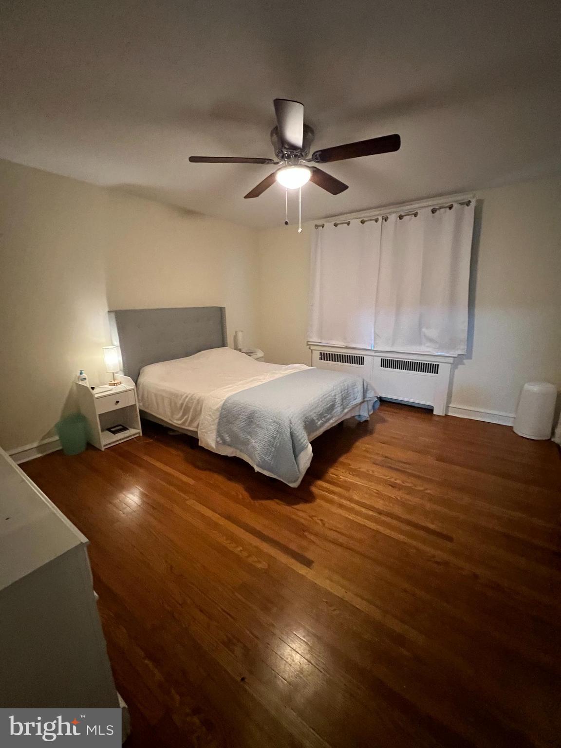 3158 Fanshawe Street Philadelphia, PA 19149 - Photo 7 of 8 a bedroom with a bed and window