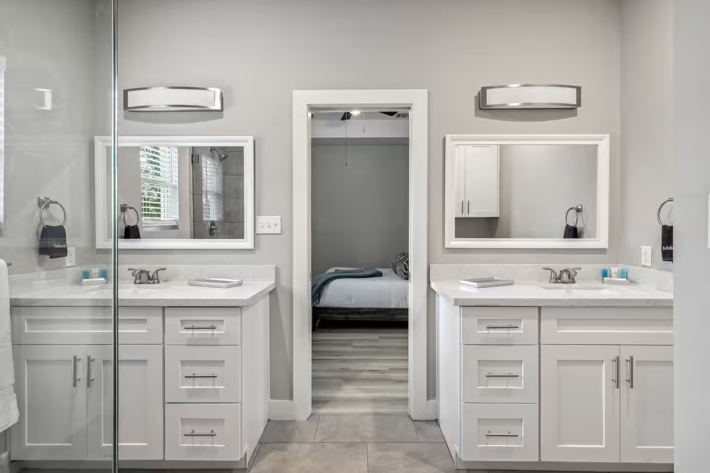 2502 Sam Wilson Street Houston, TX 77020 - Photo 14 of 15 a bathroom with a double vanity sink a mirror and a bathtub