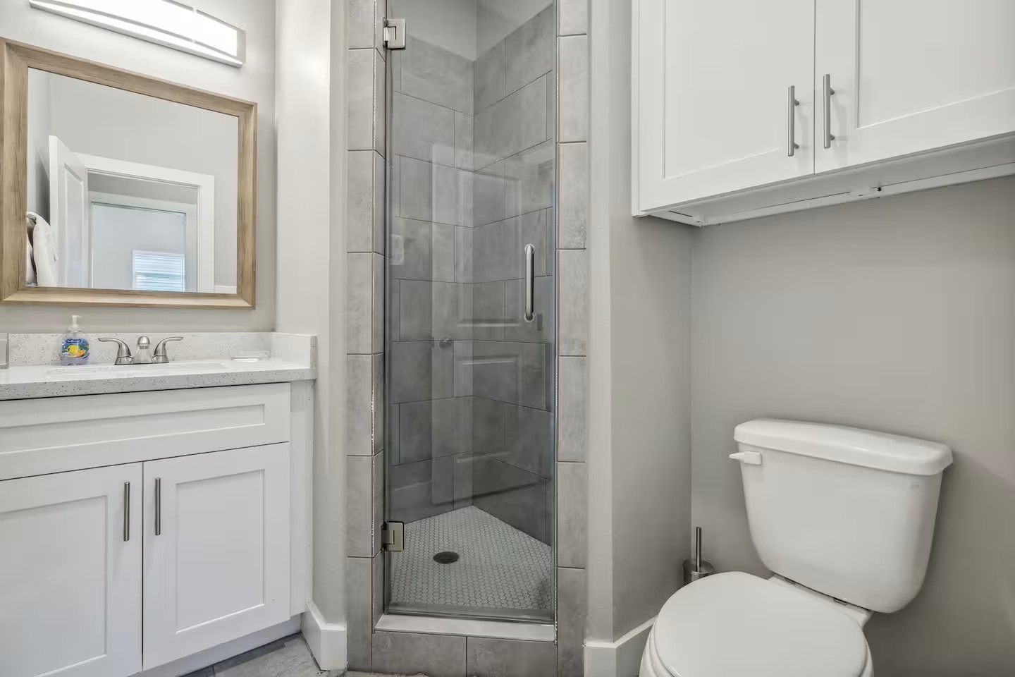2502 Sam Wilson Street Houston, TX 77020 - Photo 15 of 15 a bathroom with a toilet sink vanity and granite