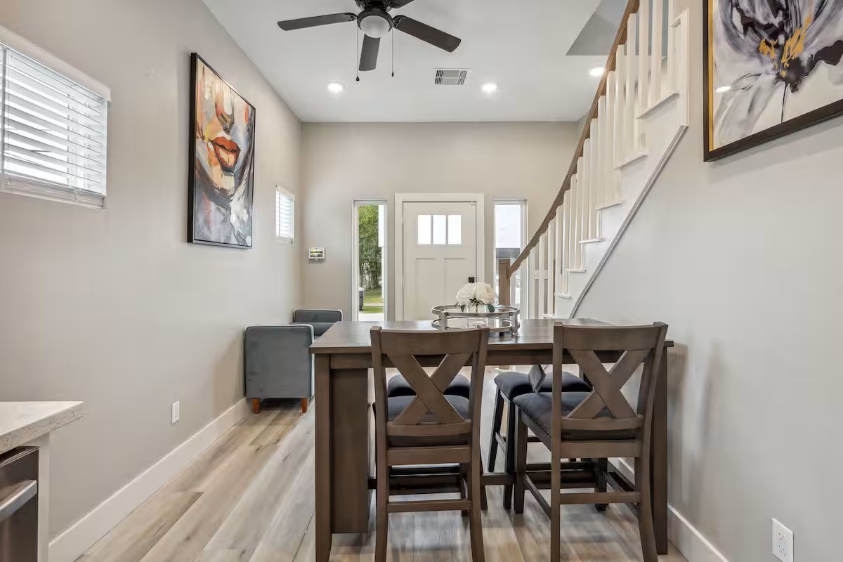 2502 Sam Wilson Street Houston, TX 77020 - Photo 2 of 15 a view of a dining room with furniture and wooden floor