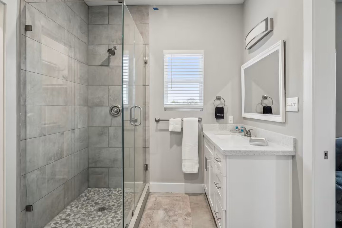 2502 Sam Wilson Street Houston, TX 77020 - Photo 6 of 15 a bathroom with a sink a toilet and shower