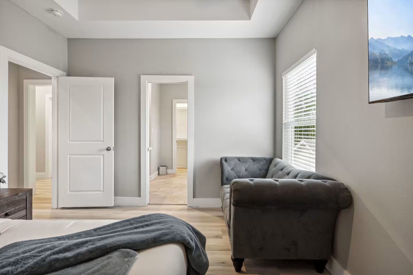 2502 Sam Wilson Street Houston, TX 77020 - Photo 7 of 15 a bedroom with a bed and a couch