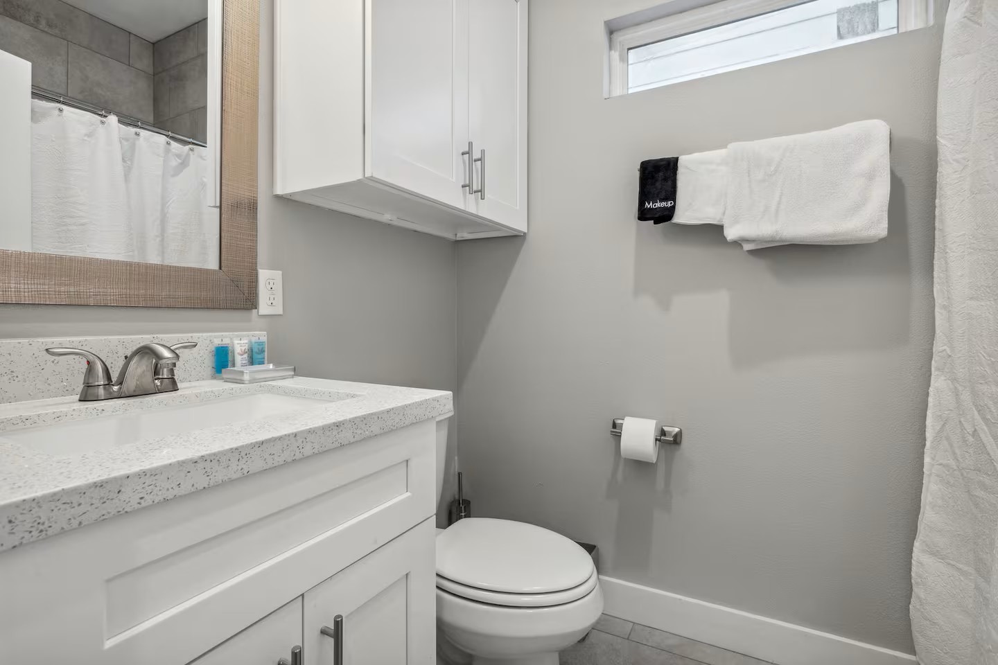 2502 Sam Wilson Street Houston, TX 77020 - Photo 8 of 15 a bathroom with a granite countertop toilet sink and mirror