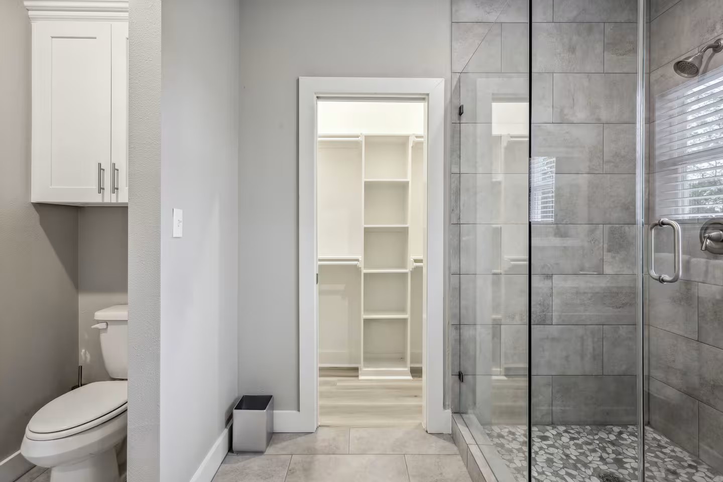 2502 Sam Wilson Street Houston, TX 77020 - Photo 9 of 15 a bathroom with a shower and a toilet