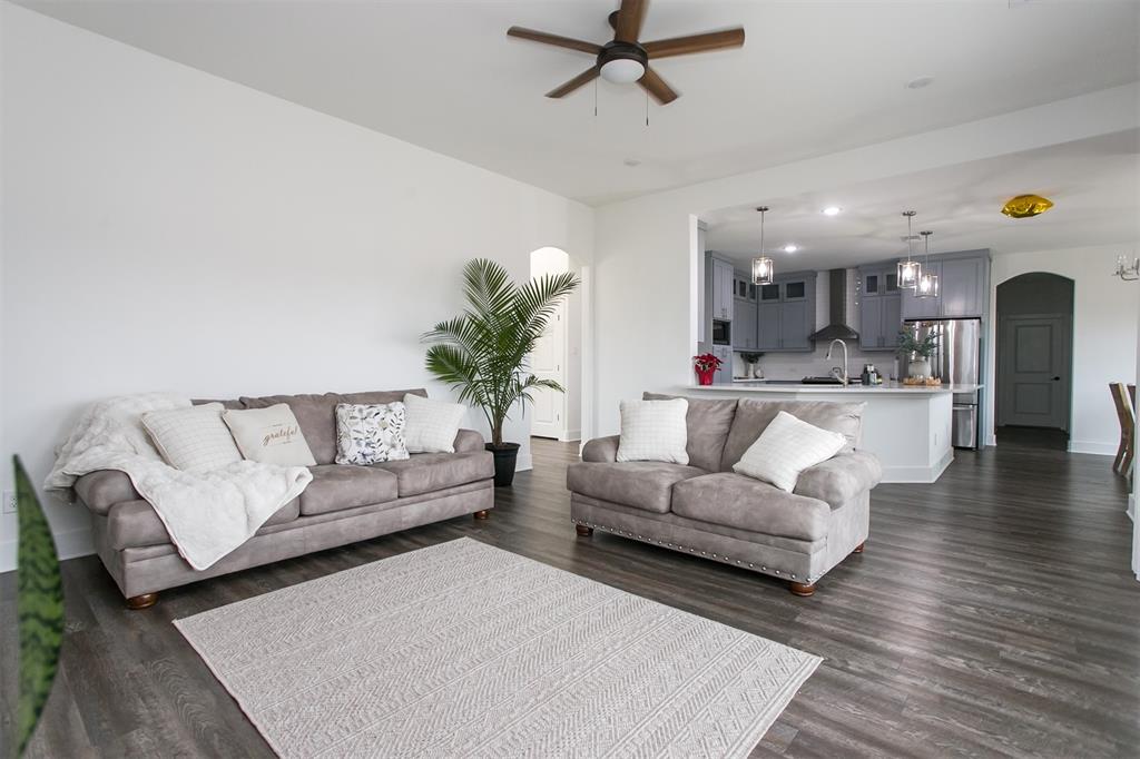 1006 Johnson Trail Bells, TX 75414 - Photo 3 of 19 a living room with furniture and a view of kitchen