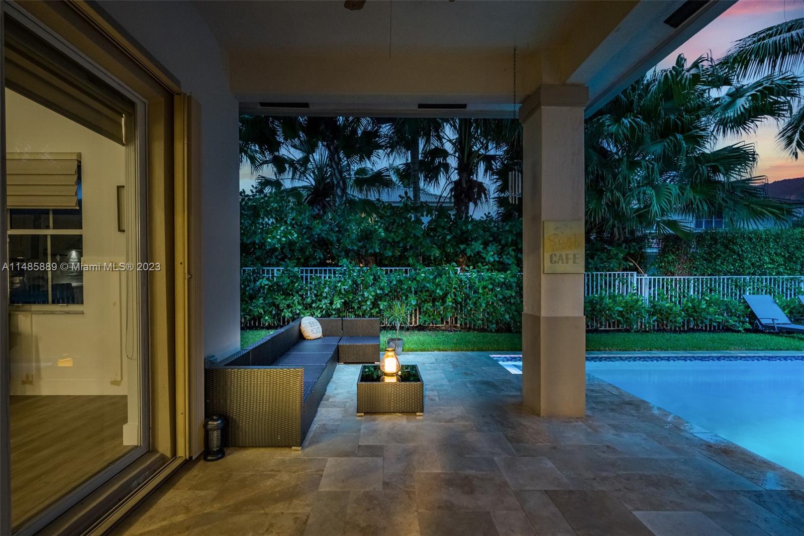 1955 Timberline Road Weston, FL 33327 - Photo 42 of 48 a view of a porch with plants and garden