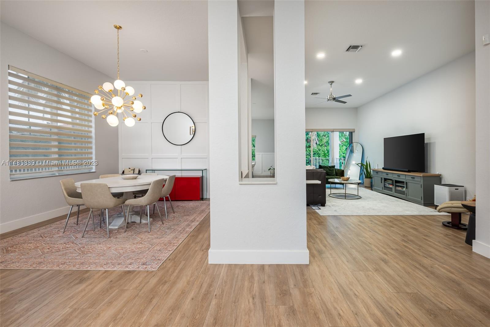 1955 Timberline Road Weston, FL 33327 - Photo 6 of 48 a view of a dining room with furniture window and wooden floor