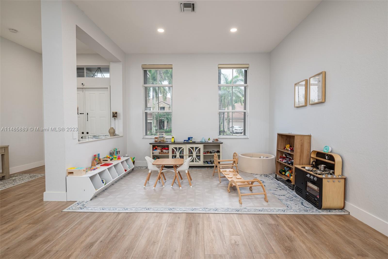 1955 Timberline Road Weston, FL 33327 - Photo 9 of 48 a living room with furniture and a wooden floor
