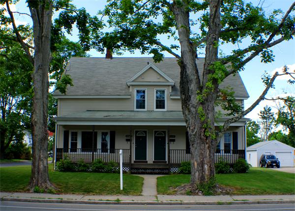 2206-2208 Main Street Three Rivers, MA 01080 - Photo 1 of 6 a front view of a house with garden