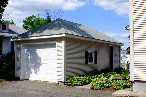 2206-2208 Main Street Three Rivers, MA 01080 - Photo 2 of 6 a front view of a house with a yard