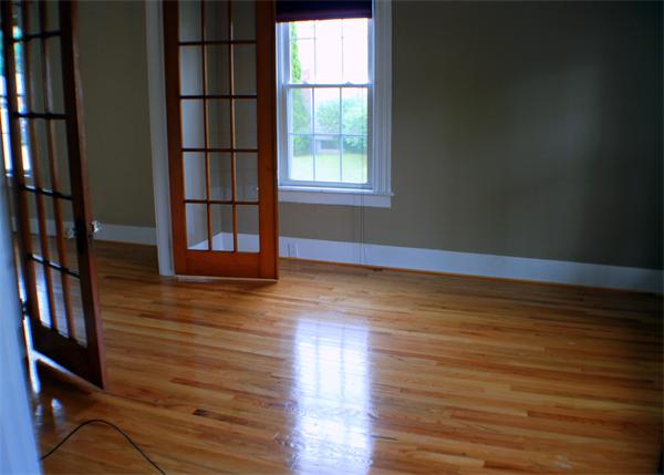 2206-2208 Main Street Three Rivers, MA 01080 - Photo 5 of 6 a view of an empty room with wooden floor and a window