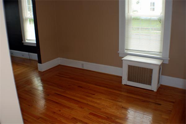 2206-2208 Main Street Three Rivers, MA 01080 - Photo 6 of 6 a view of an empty room with wooden floor and a window