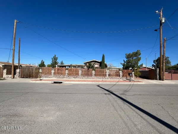 a view of a backyard of the house