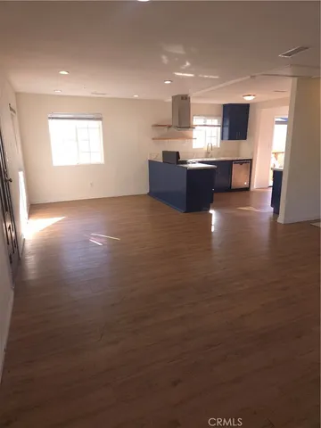 a view of kitchen and window with microwave