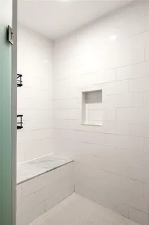 a bathroom with 2 sink and a mirror