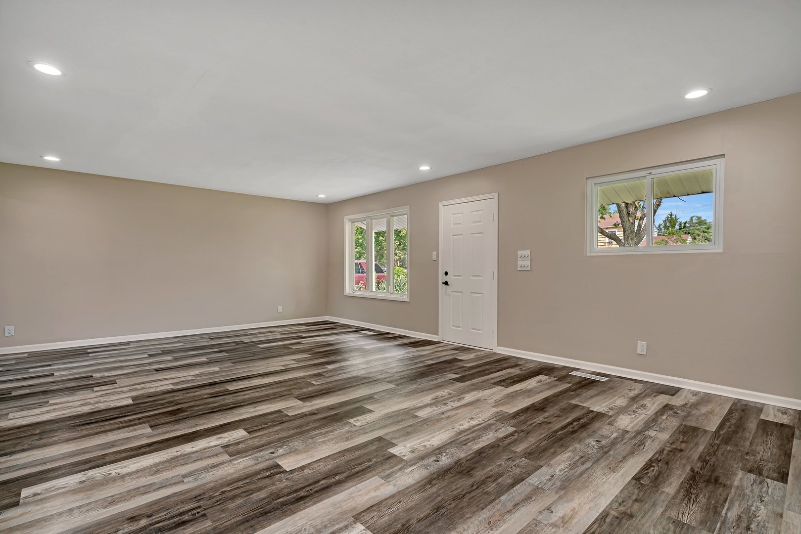 144 Queenswood Road Bolingbrook, IL 60440 - Photo 2 of 15 a view of room with window and ceiling fan