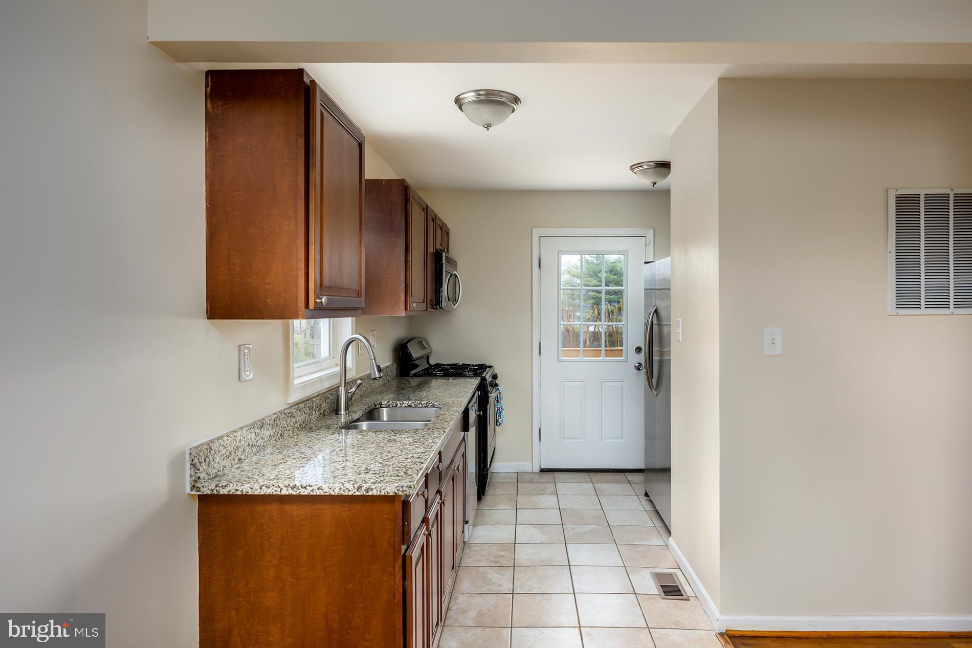 Updated kitchen with granite countertops