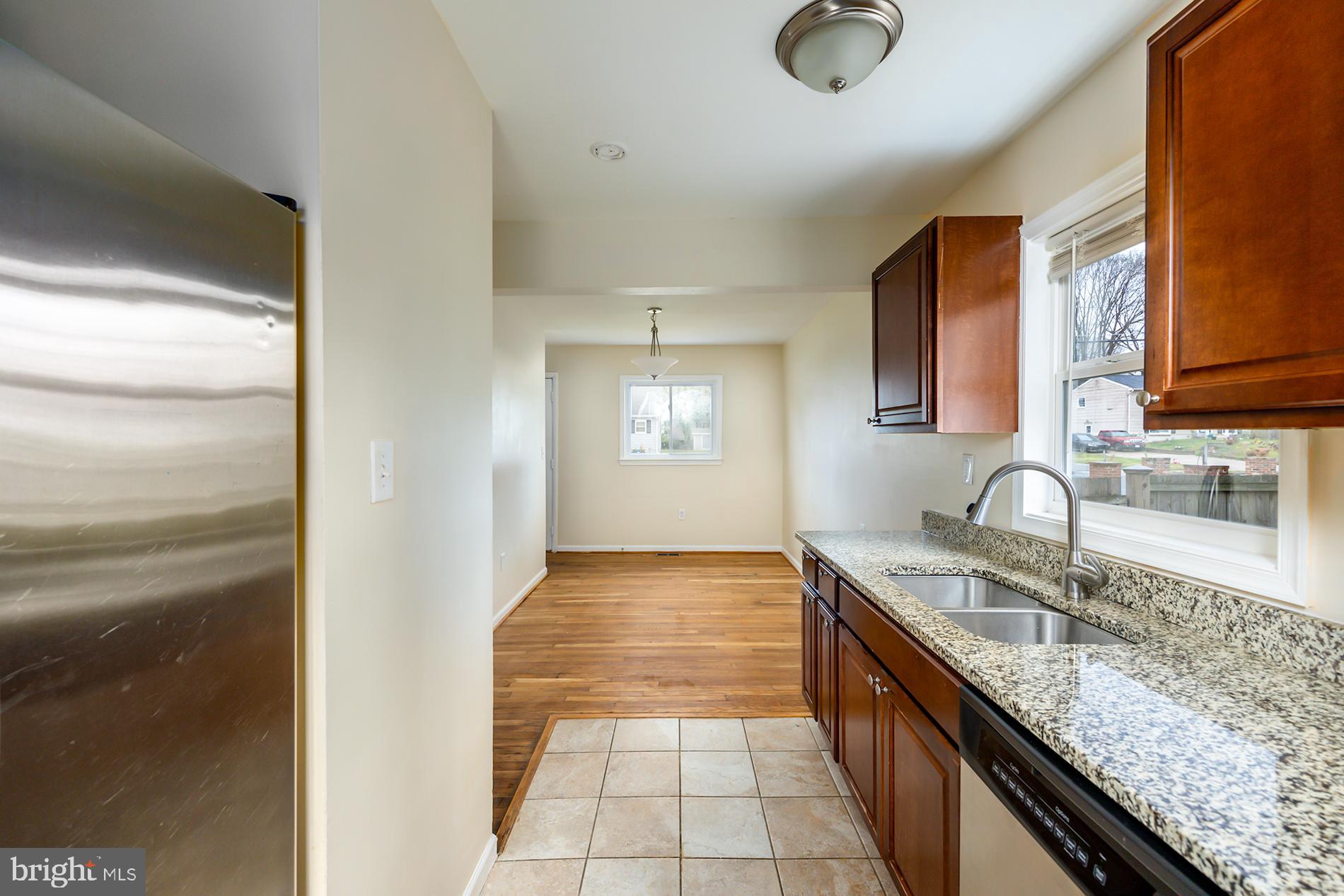 15211 Michigan Rd. Woodbridge, VA 22191 - Photo 10 of 38 Open design kitchen to dining area