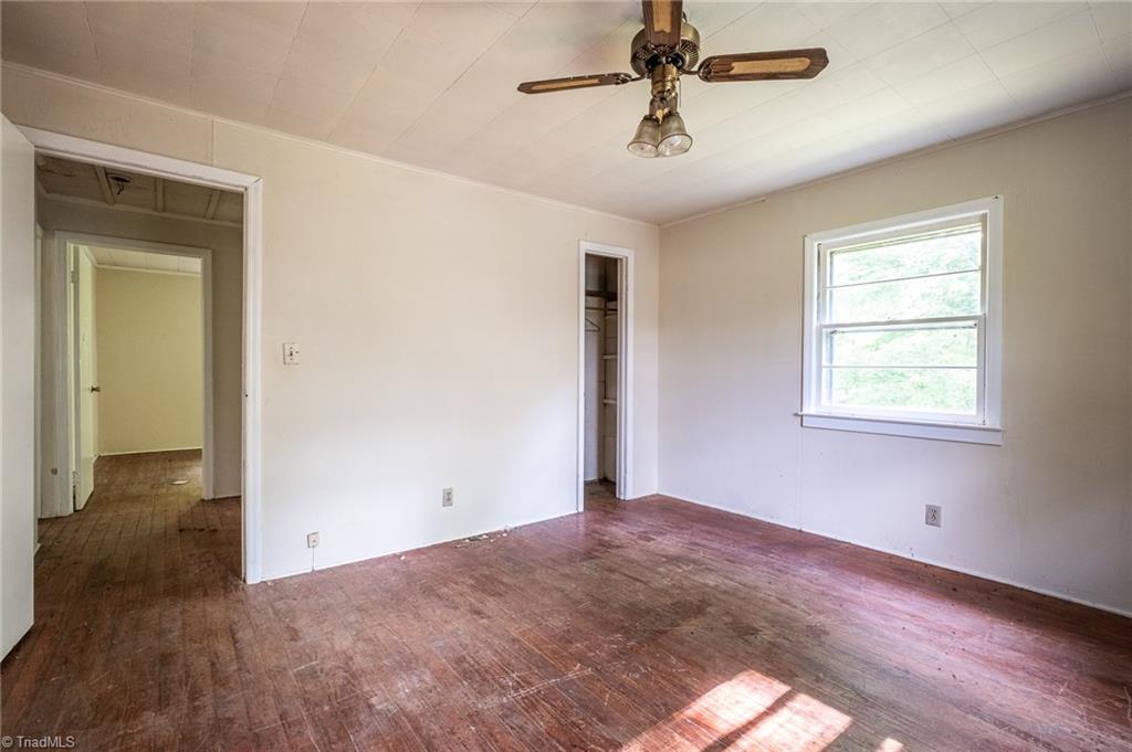 852 Joe Layne Mill Road Elkin, NC 28621 - Photo 14 of 22 Third of three bedrooms looking toward hallway.