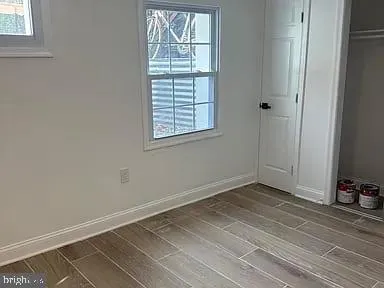 a view of a room that has a window in it