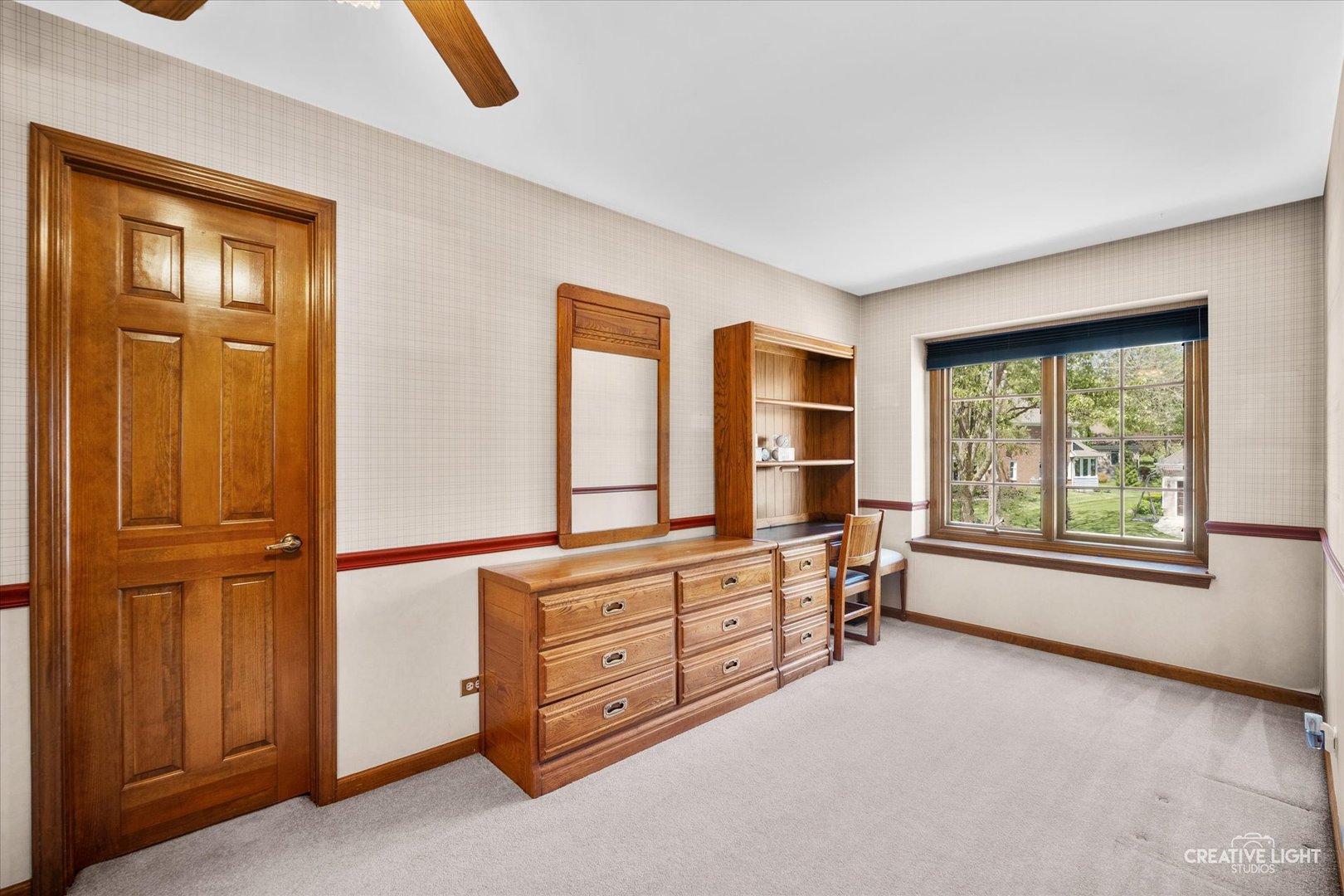 3112 Turnberry Road St. Charles, IL 60174 - Photo 25 of 43 an empty room with windows and cabinet
