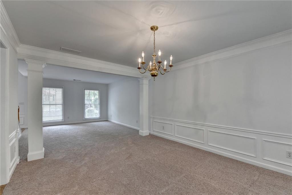 6535 Ganton Drive Duluth, GA 30097 - Photo 15 of 75 wooden floor in an empty room with a window