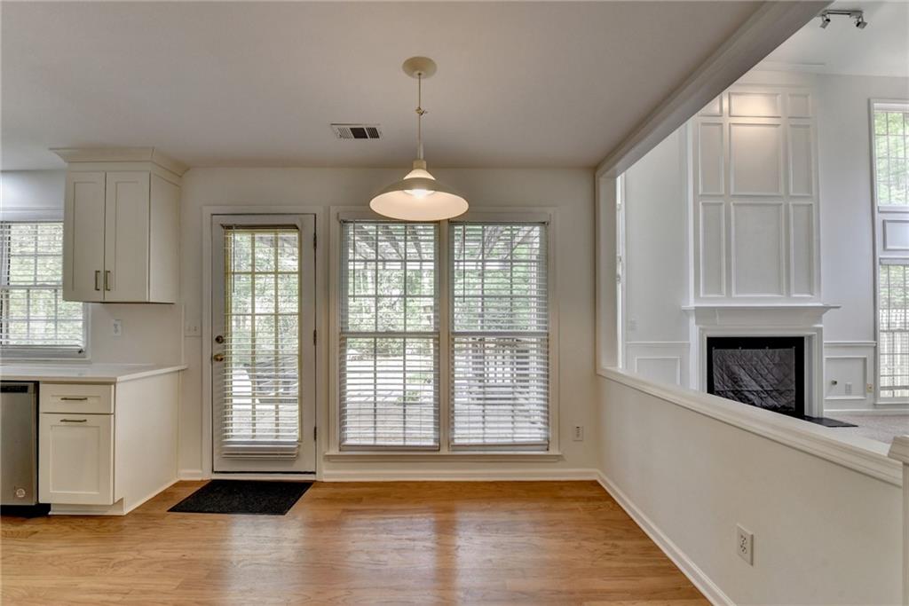 6535 Ganton Drive Duluth, GA 30097 - Photo 29 of 75 a view of an empty room with window and fireplace