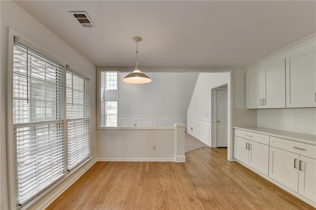 6535 Ganton Drive Duluth, GA 30097 - Photo 30 of 75 a view of empty room with wooden floor and fan