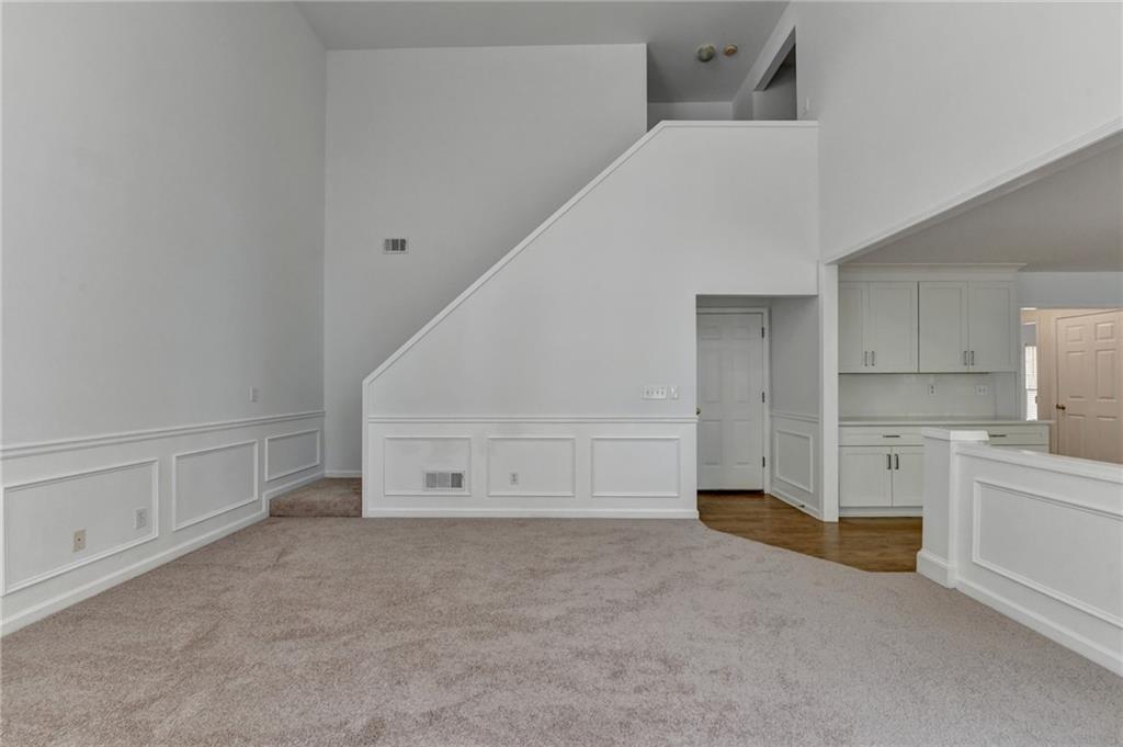 6535 Ganton Drive Duluth, GA 30097 - Photo 38 of 75 a view of a kitchen with white cabinets and entryway