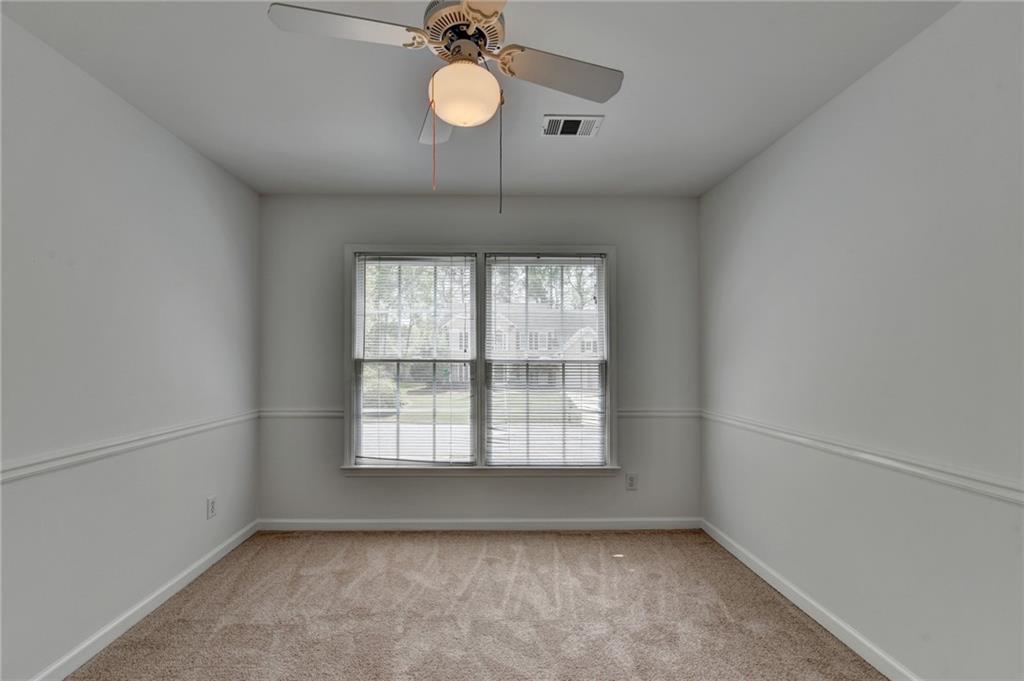 6535 Ganton Drive Duluth, GA 30097 - Photo 44 of 75 an empty room with a window