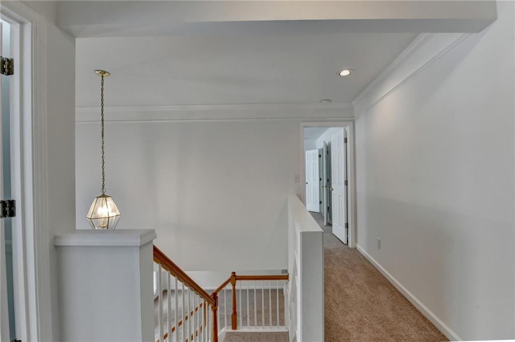 6535 Ganton Drive Duluth, GA 30097 - Photo 46 of 75 a view of empty room with wooden floor