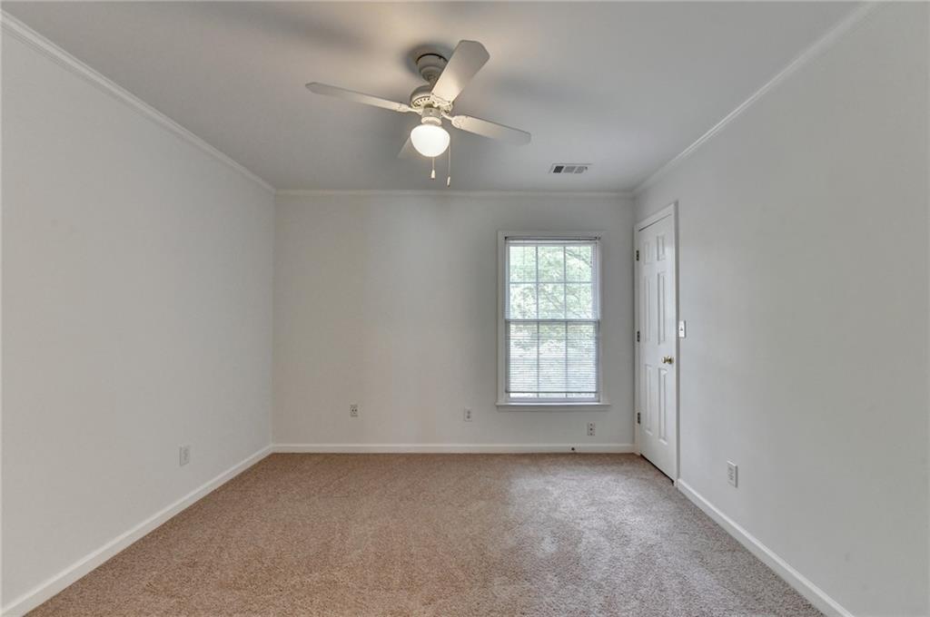 6535 Ganton Drive Duluth, GA 30097 - Photo 57 of 75 an empty room with a window