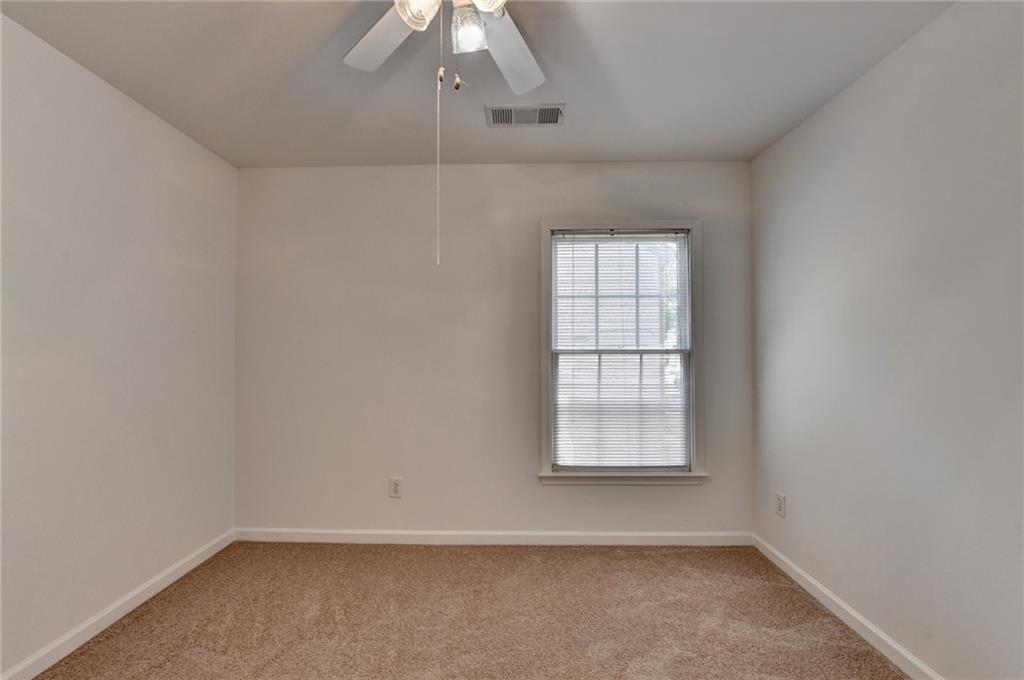 6535 Ganton Drive Duluth, GA 30097 - Photo 62 of 75 an empty room with a window