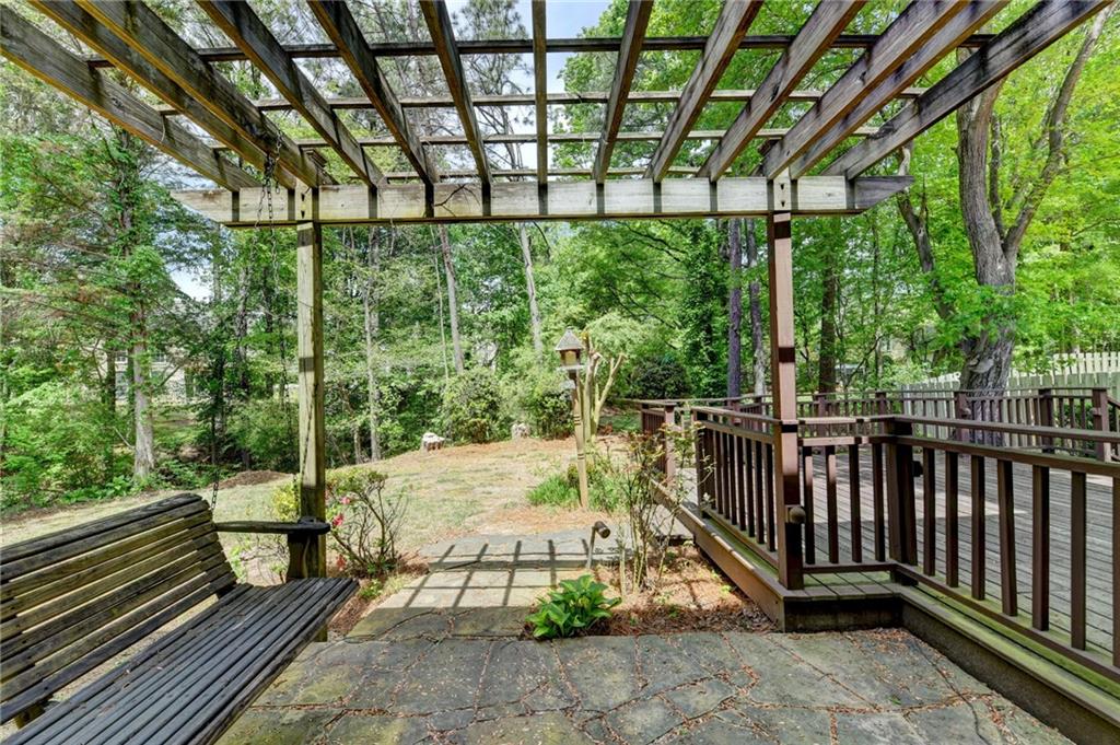 6535 Ganton Drive Duluth, GA 30097 - Photo 65 of 75 a balcony with trees in front of it