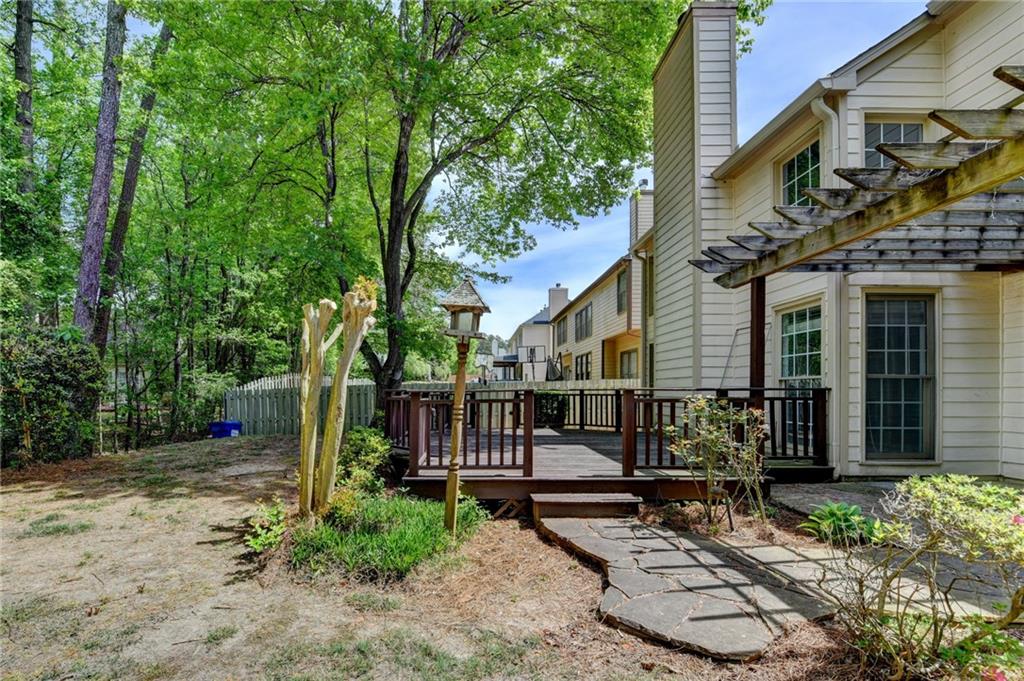6535 Ganton Drive Duluth, GA 30097 - Photo 68 of 75 a view of a house with backyard and sitting area