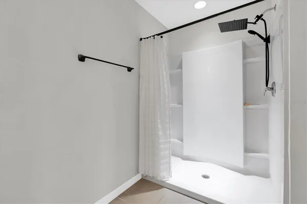 a view of livingroom with furniture and a window